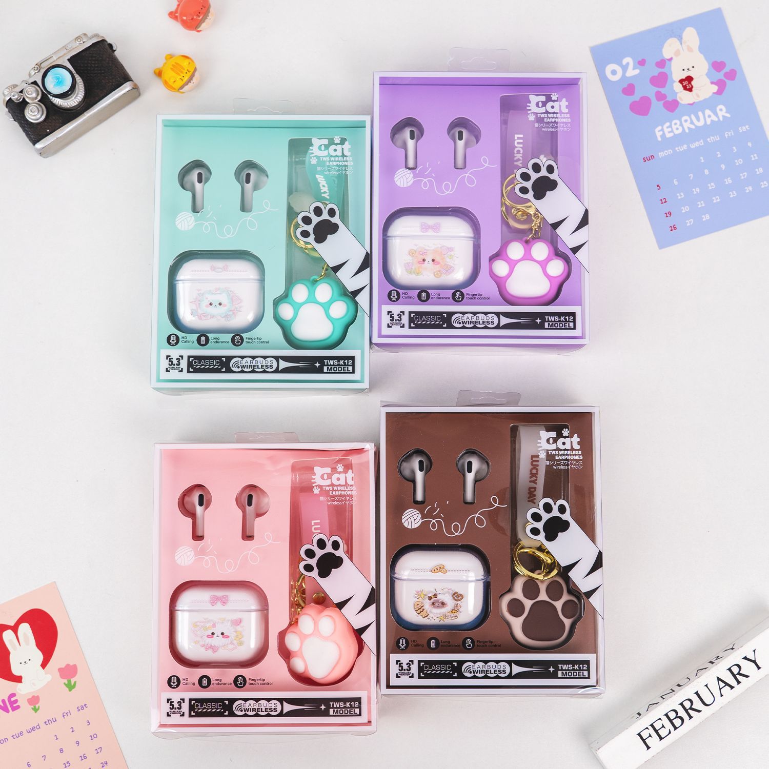 Cross-border best-selling TWS-K12 in-ear wireless Bluetooth earphones set with cat-paw silicone pendant and silicone protective case