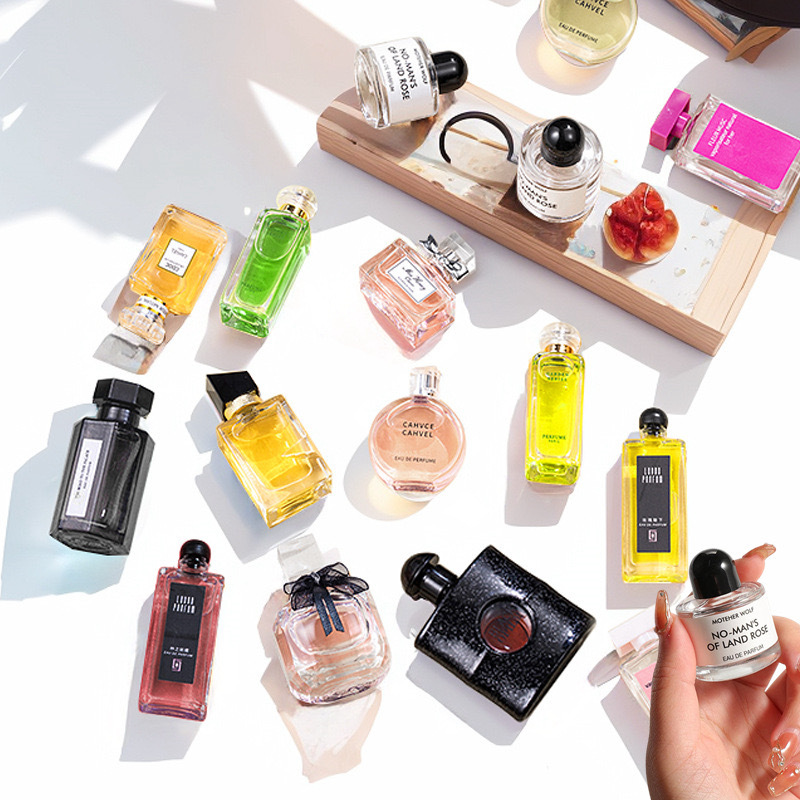 XKN sample Q‑style perfume, long-lasting, fresh and natural light fragrance for men and women, black duck‑shaped bottle—direct from the factory, wholesale and dropshipping available.