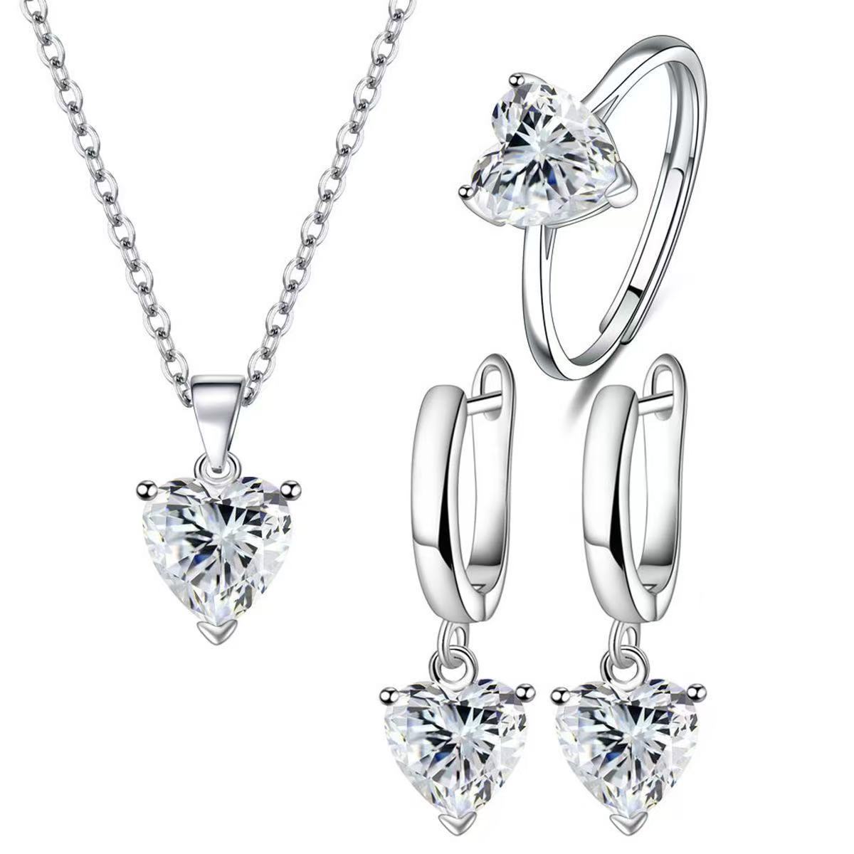 Amazon AliExpress cross-border heart-shaped zircon set: creative heart‑shaped ear clips, ring, pendant, and necklace—three-piece set.