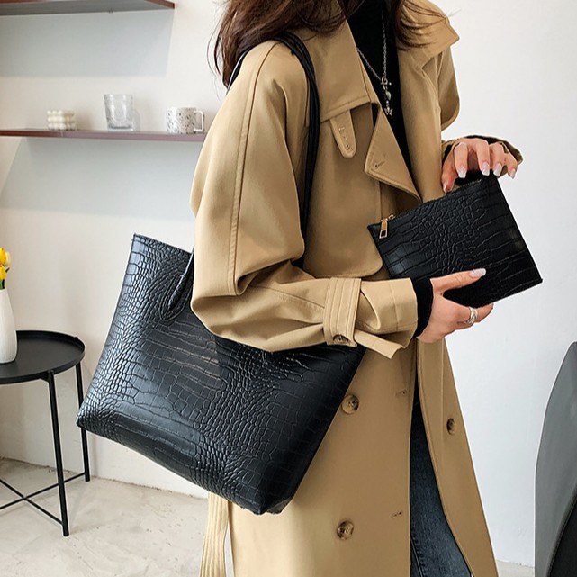 European and American‑style trendy women’s bag: versatile shoulder bag, hand‑held tote; new‑arrival fashionable tote, part of a multi‑piece set featuring simple, nested‑size bags.