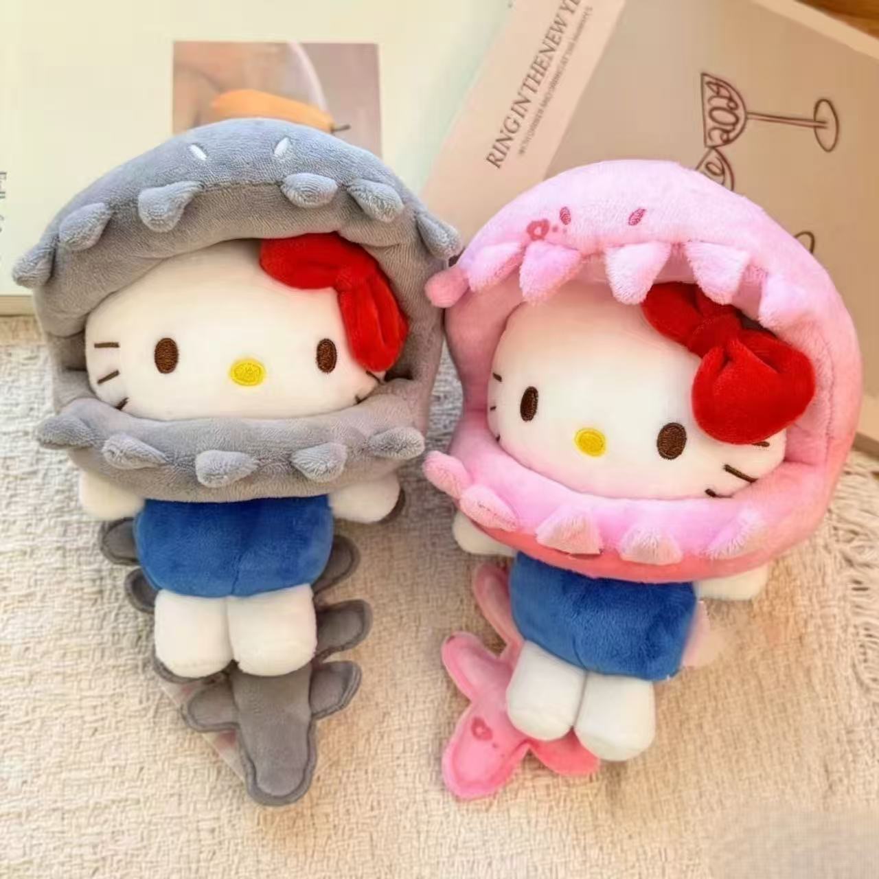 Best-selling Hello Kitty dress-up skeleton dinosaur, ugly fish bag charm, KT cat pendant, and plush toy