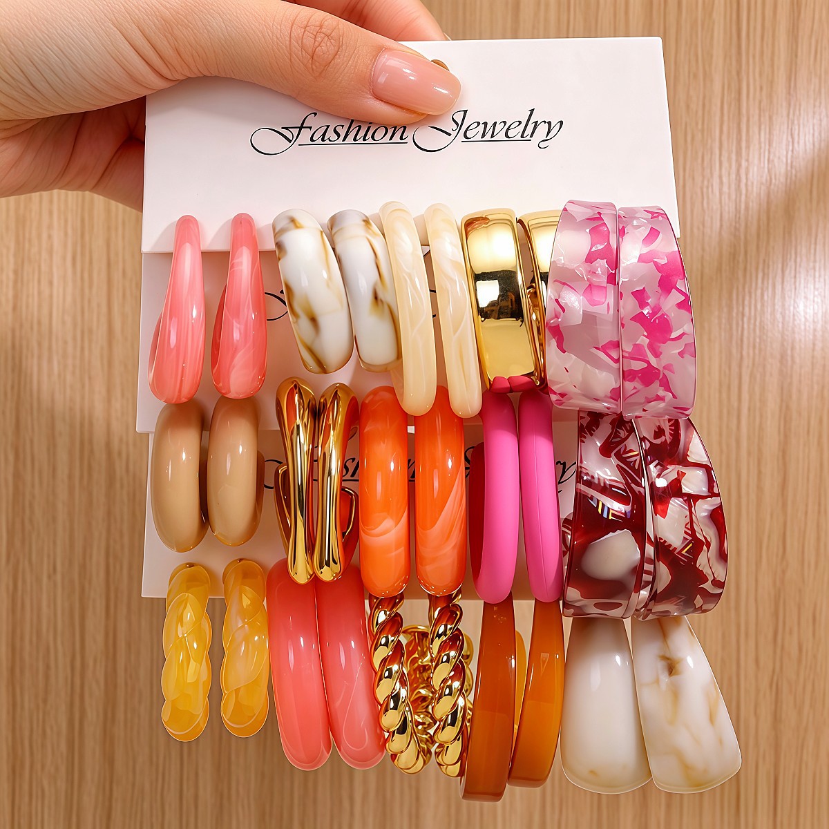 Cross-border European and American bestsellers: multi-color women’s earring sets—light luxury, fashionable, and creatively designed with C-shaped elements.