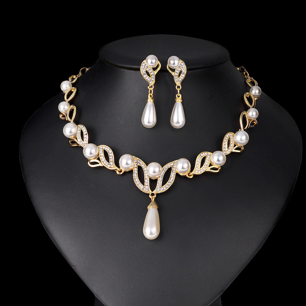Imitation gold stud earrings/clip-on earrings, necklace and earring set with pearl jewelry—bridal leaf-shaped long water-drop pearl necklace