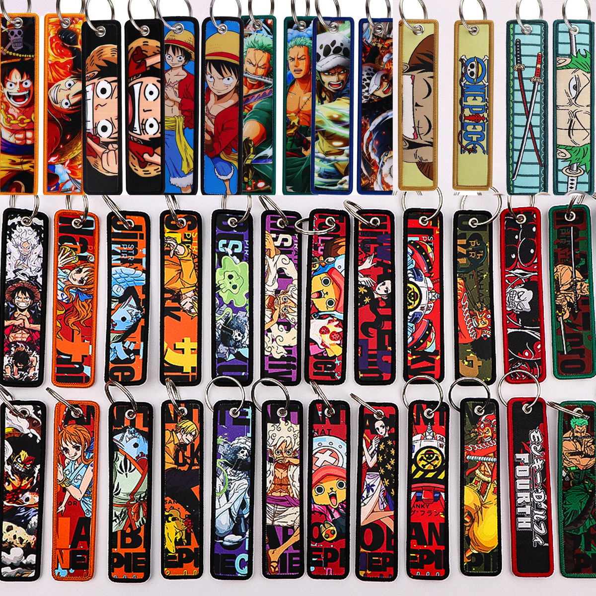 One Piece Luffy woven-label keychain, Zoro cartoon keychain, bag charm with fabric‑woven chain—ideal for holiday gifts.