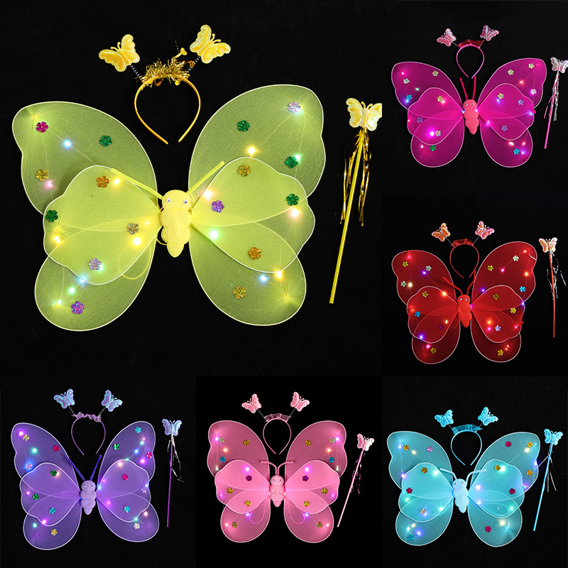 Angel girl glowing children’s butterfly wings—magical back accessory, toy for girls, and fairy princess costume gift.