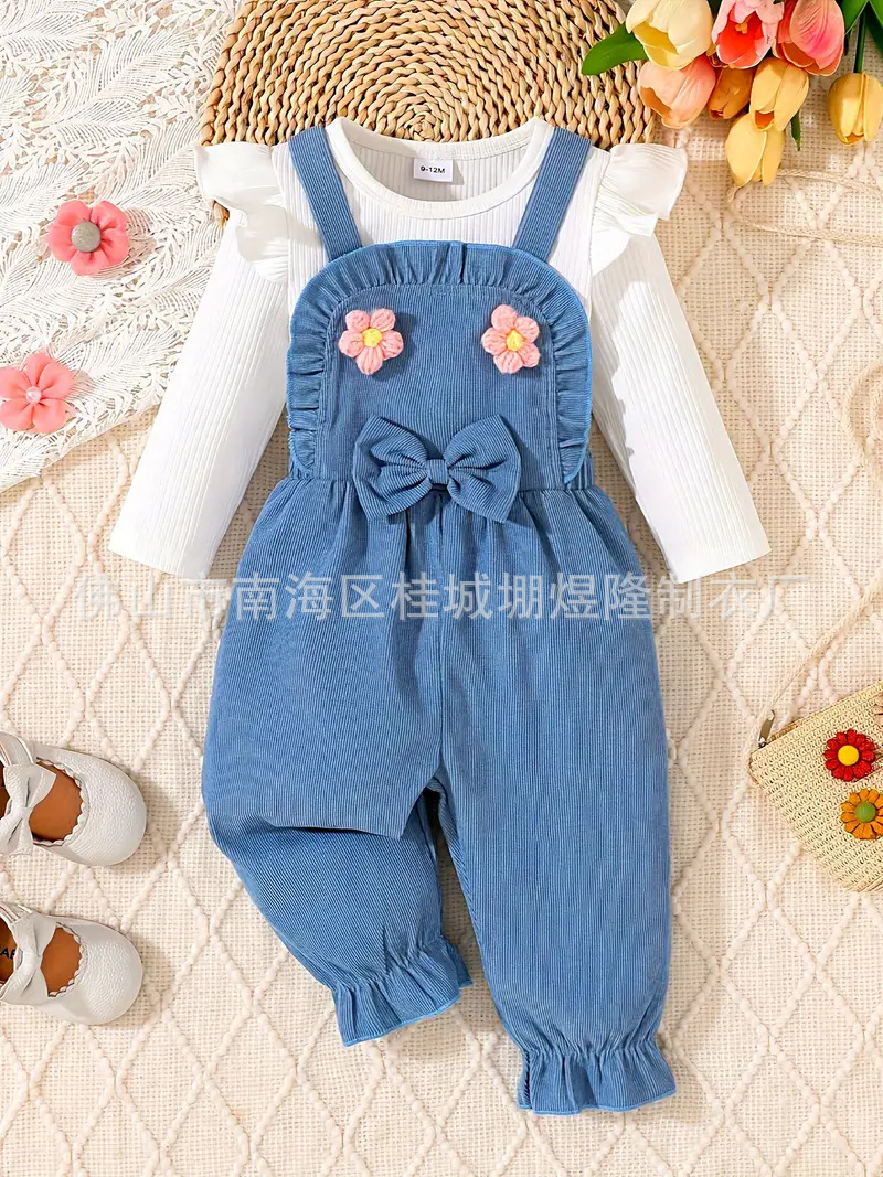 Baby girl’s autumn/winter jumpsuit set: 3D floral design, blue and white ribbed top.