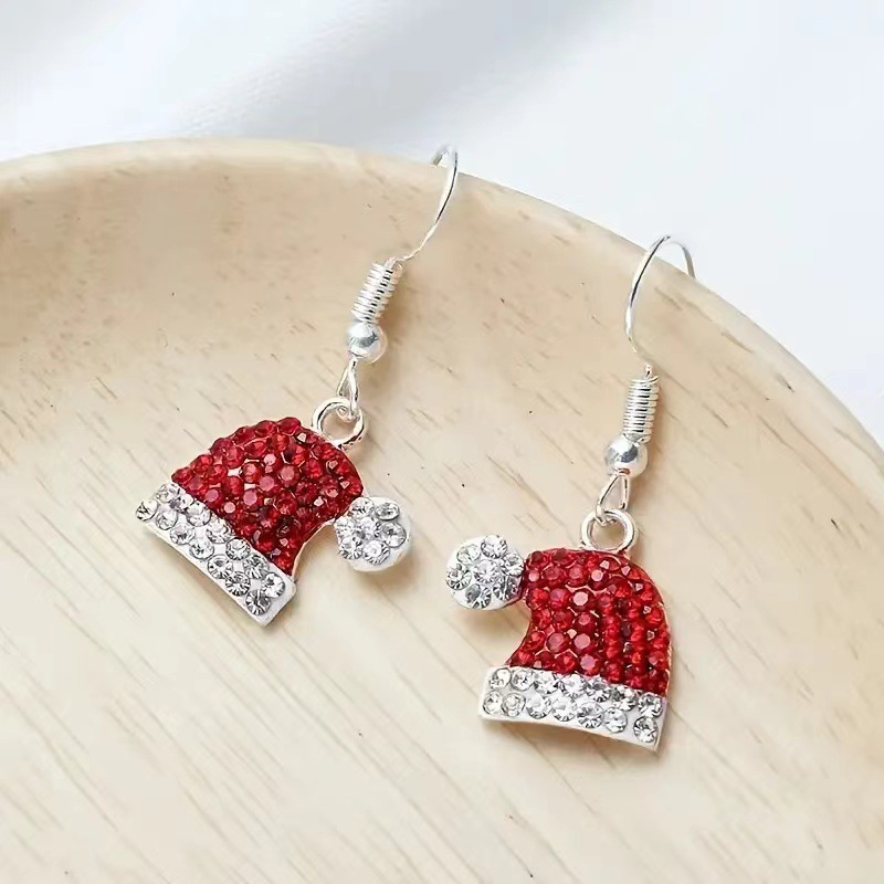 Christmas earring bestseller: Christmas hat stud earrings—cute, fresh European and American style, diamond‑decorated autumn/winter hook earrings; factory direct sales
