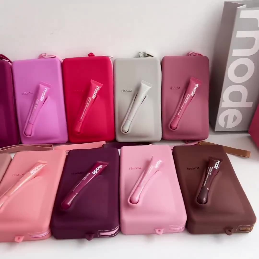 Best-selling RHODE silicone storage pouch—can hold lipsticks and liquid lipsticks; slim, portable earphone case with coin pocket.