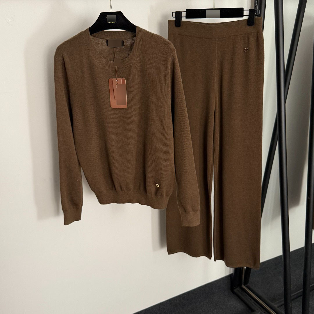 Shenzhen Nanyou goods high-end cross-border metal ring decorated pullover long-sleeve knit top + high-waisted figure-flattering trousers