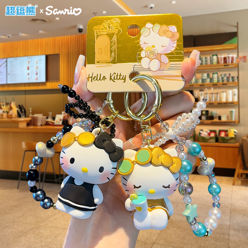 The official version of the Three Lions Holiday Kitten Poppy Keychain is a cartoon creative beaded necklace for couples package pendants